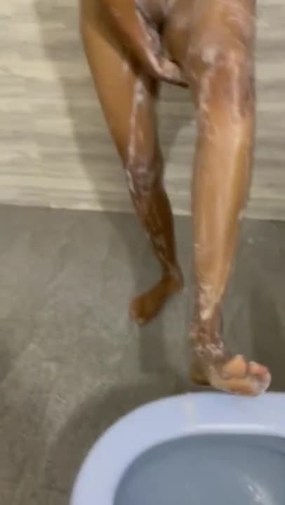 Sri Lankan girl having a bath and sucking dick